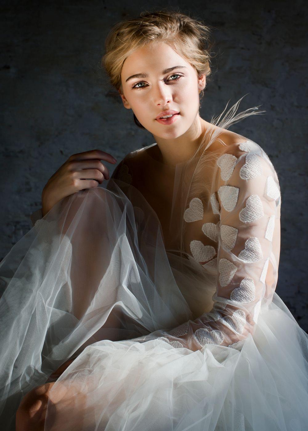 high class bridal wedding picture in a lena hoschek couture, transparent wedding dress